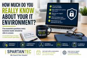 Business leader reviewing IT visibility, cybersecurity monitoring, backups, and managed IT responsibilities.